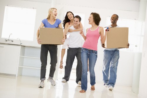 Same day removals team loading furniture in Kensington