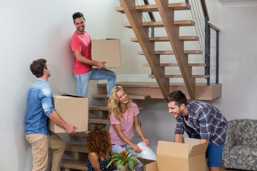 Professional movers loading boxes for a Kensington relocation