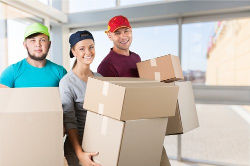 Moving boxes and furniture being prepared for flat removals in Kensington
