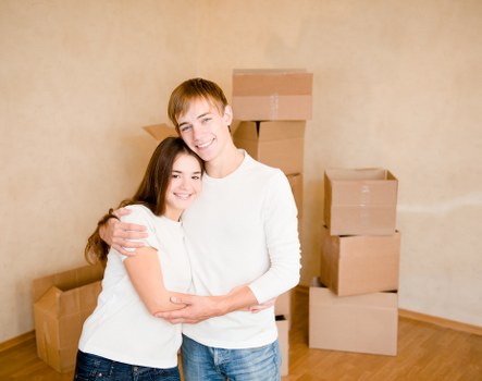 Team preparing for office relocation in Kensington with labeled boxes