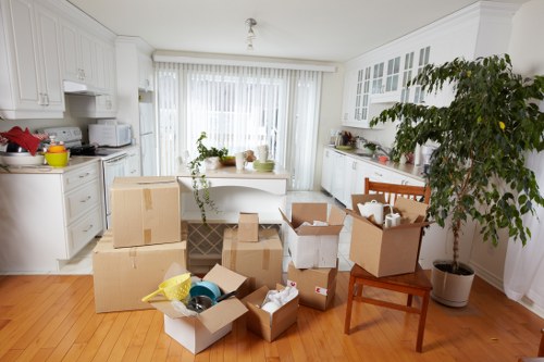 Fragile item packing setup with protective materials in Kensington