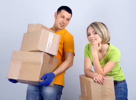Professional Kensington movers handling bulky household furniture