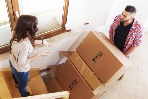 Loading items into a removals van for transport