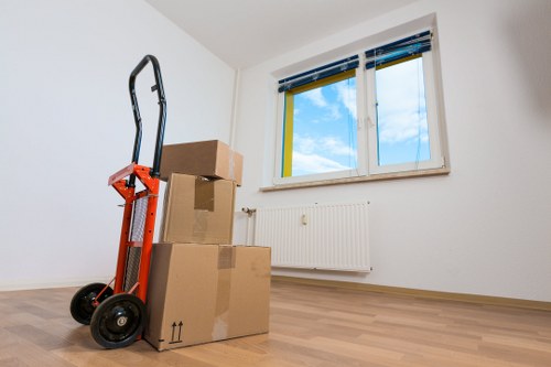 Team of house removalists in Kensington handling furniture with care