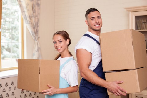 Careful wrapping of fragile items during packing services