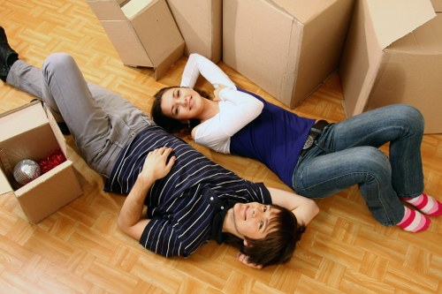 Local moving van navigating Kensington area with loading assistance