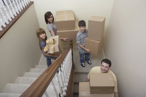 Trained removal staff handling items carefully during a move in Kensington